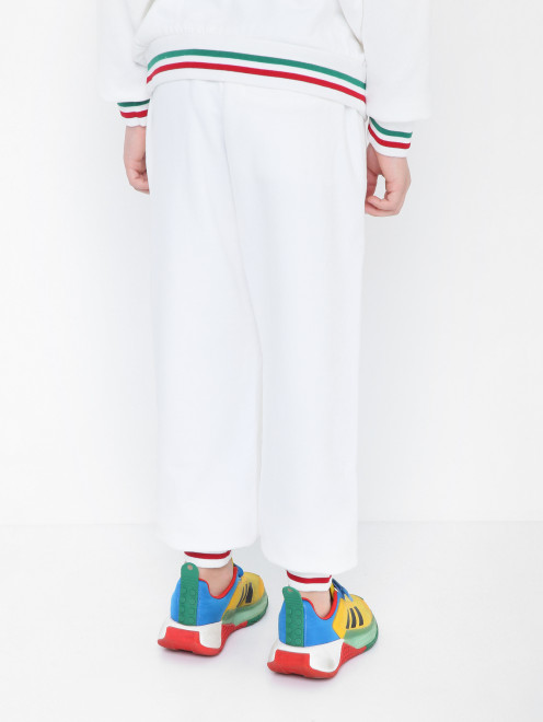 Трикотажные брюки с принтом и карманами Dolce & Gabbana - МодельВерхНиз1